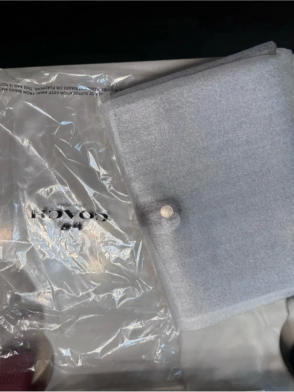 Coach Silver Tablet Sleeve with Snap Closure